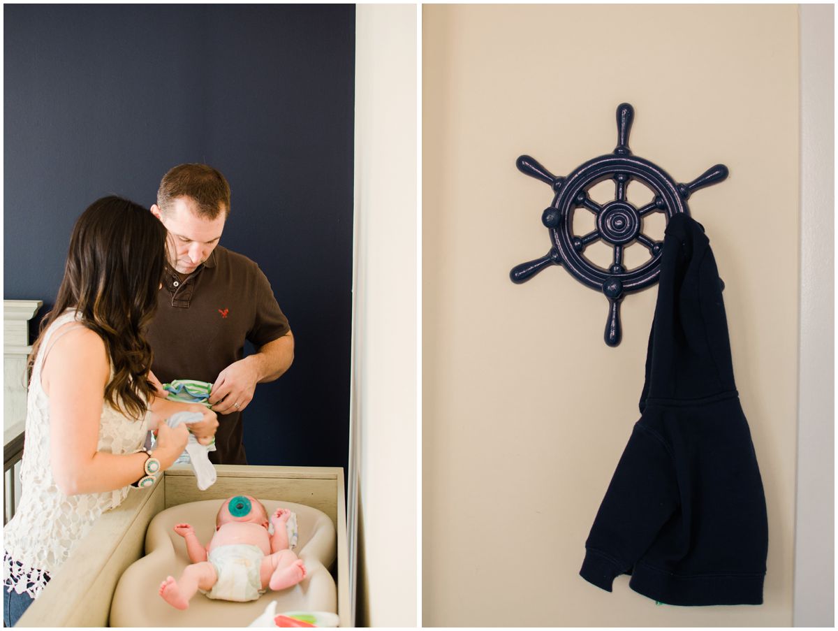 mom and dad changing their baby diaper in the decorative nursery of their Hoboken NJ home
