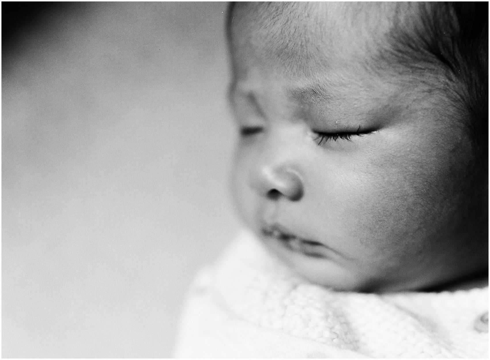 Best time to do newborn photography is around 3 weeks for the close up of baby eye lashes