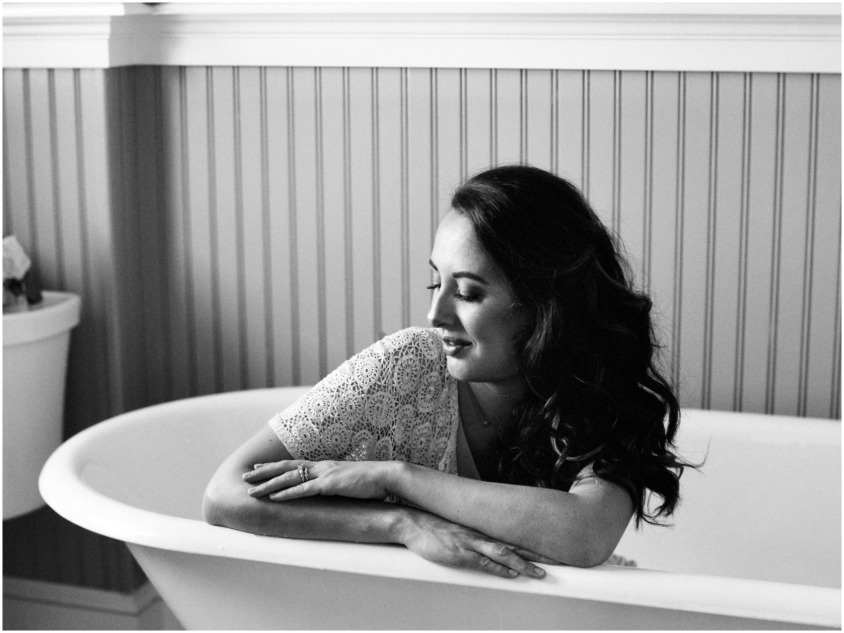 NYC Maternity photographer captures pregnant mom enjoying bath tub while being 36 weeks pregnant