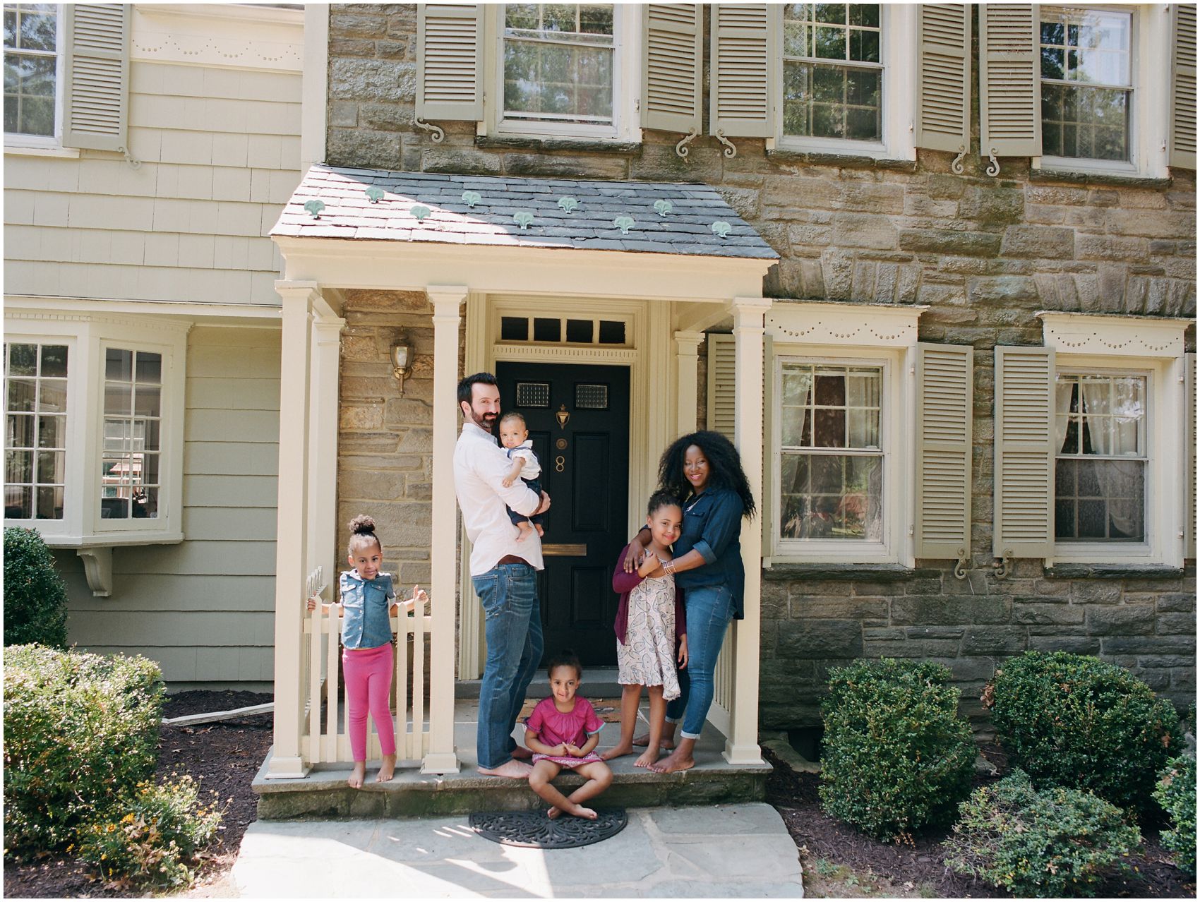 family lifestyle portraits in front of their Maplewood NJ home