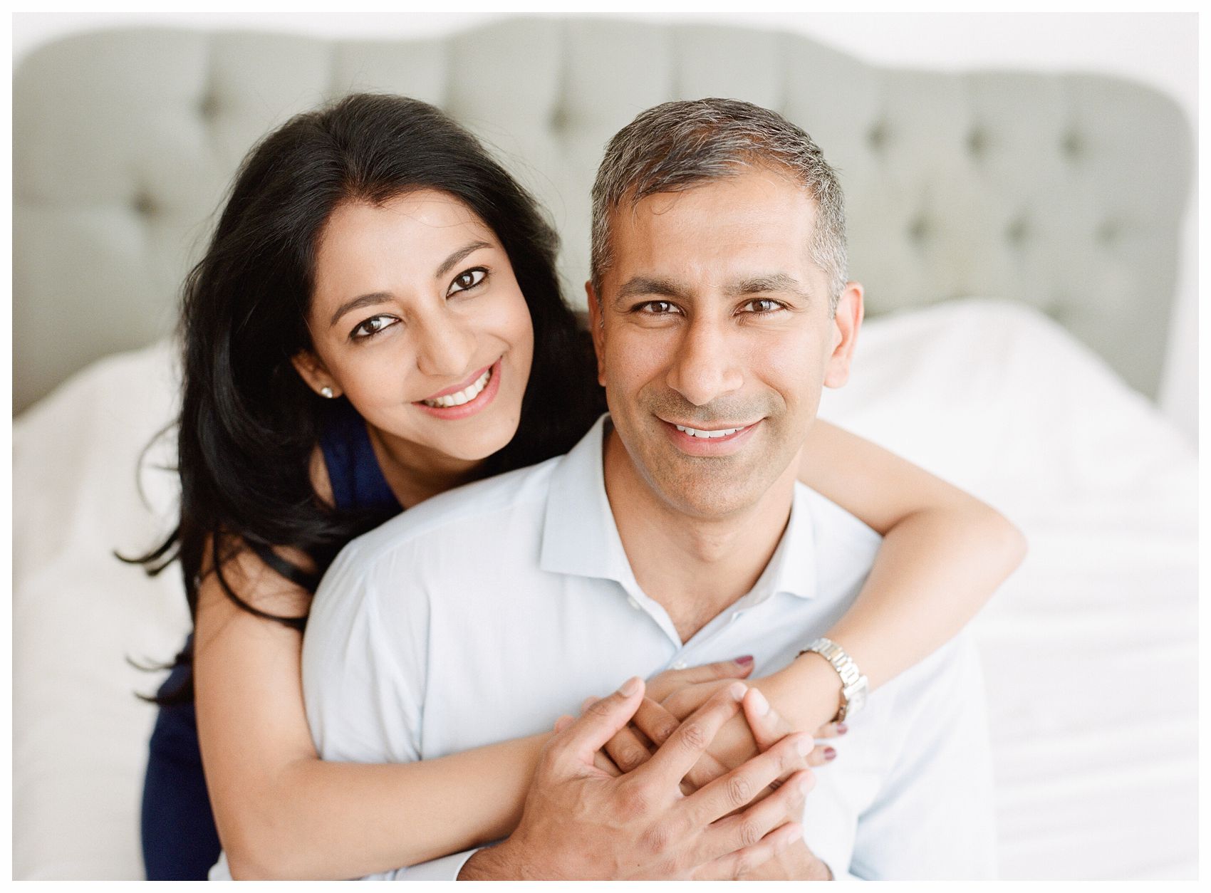 gorgeous couple posing for a family photo by Miriam Dubinsky NYC Family Photographer